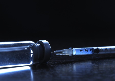 Vials of medications. Dark blue.の写真素材
