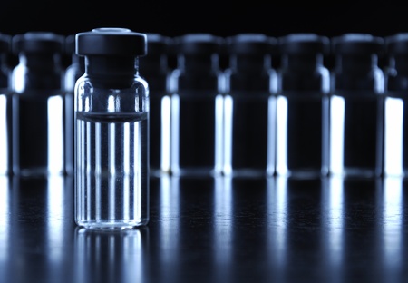 Vials of medication. dark blue.の写真素材