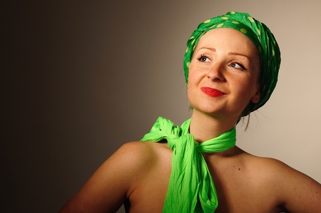 Woman in green scarf の写真素材