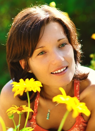 Woman in garden の写真素材