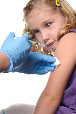 Child vaccinations on a white の写真素材