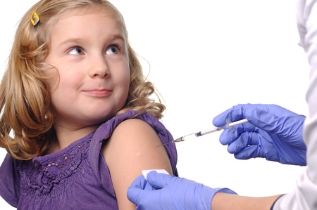 Child vaccinations on a white の写真素材