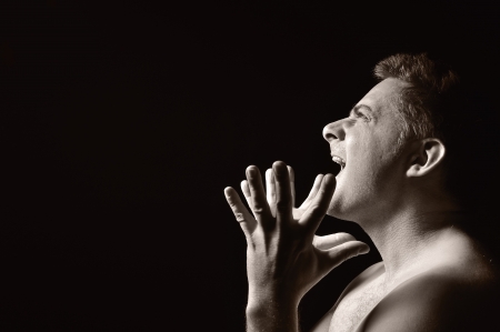 Desperate man, shouting and raging の写真素材