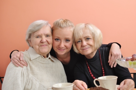 Three woman - three generations on white の写真素材