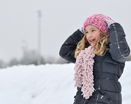 Young girl in a winter scene の写真素材