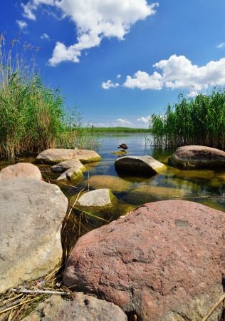 Rocks on the shore of the lake  The Sniardwy in Masuria, Poland の写真素材