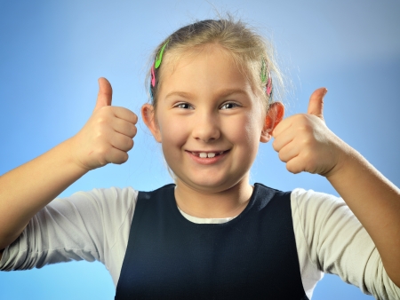 Happy child  Little blonde girl の写真素材