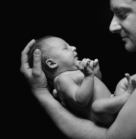 Father and his newborn baby の写真素材