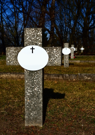 The cross on the grave of an unknown person  Abandoned cemetery の写真素材