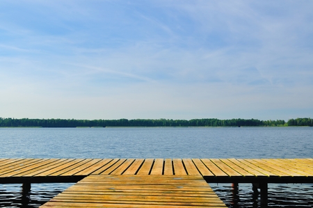 Lake with wooden pier の写真素材