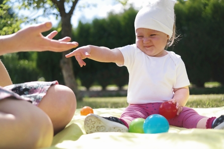 Mother and her baby in park  Happy family outdoors の写真素材
