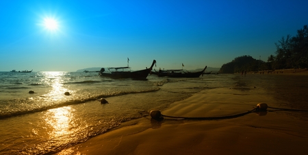 Sunset with boats on beautiful Amdaman sea in Krabi  Thailand の写真素材