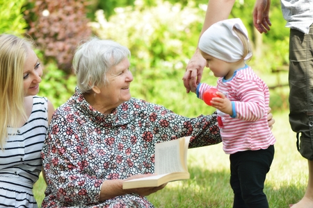 Grandmother and granddaughter  Happy and smilling family の写真素材