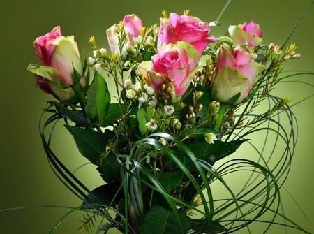 Bouquet of pink roses on green background.の写真素材