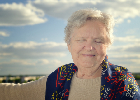 Senior woman smiling.