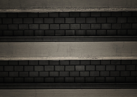 Dark brick wall.