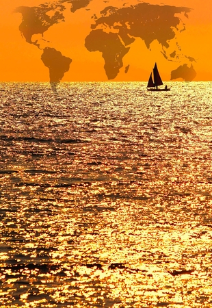 World map on the background of sky with clouds.の写真素材