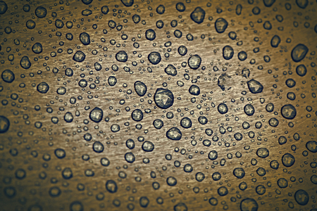 Water drops background. Brown.の写真素材