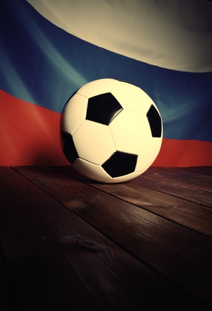 Flag of Russia with football on wooden boards as the background. Vintage Style.の写真素材