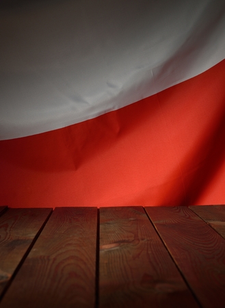 Flag of the Poland with wooden boards as a background.の写真素材