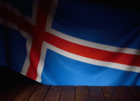 Flag of the Iceland with wooden boards as a background.の写真素材