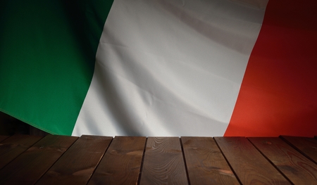 Flag of the Italy with wooden boards as a background.の写真素材