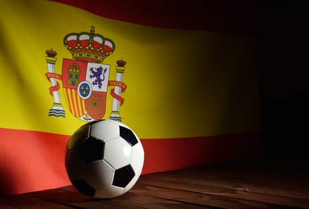 Flag of Spain with football on wooden boards as the background. Vintage Style.の写真素材