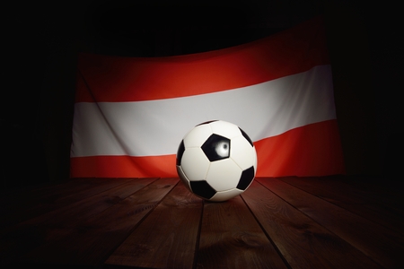 Flag of Austria with football on wooden boards as the background.の写真素材