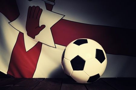 Flag of Northern Ireland with football on wooden boards as the background. Vintage Style.の写真素材
