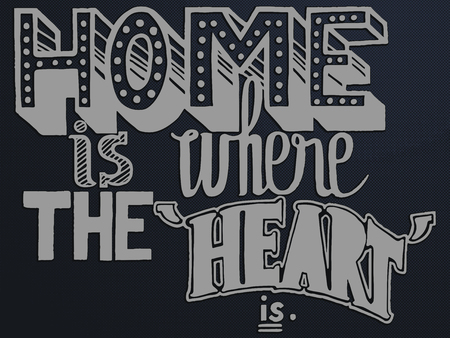 A vector illustration of the quote home is where the heart is with different stylistic hand drawn fontsのイラスト素材