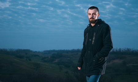 Portrait of a mature handsome man restingの写真素材