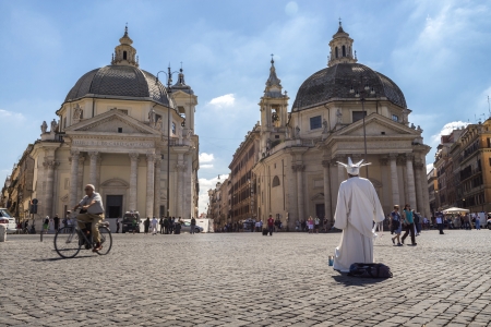Rome, Italy - September 23, 2013 People passing from Piazza del Popolo, by the  twin  churches of...