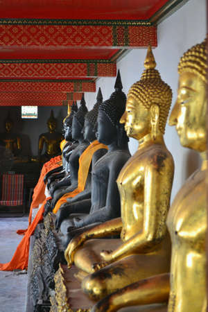 The old images of Buddha in WatPho, Bangkok, Thailand.