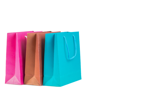 Color paper shopping bag isolated on white backgroundの写真素材