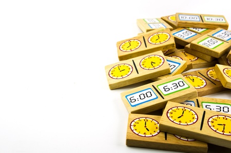 Colorful and round toy clock isolated in white backgroundの写真素材