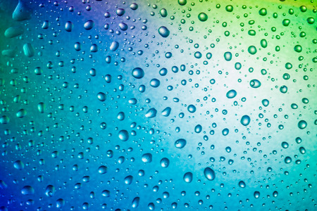 Background of water drops on glassの写真素材