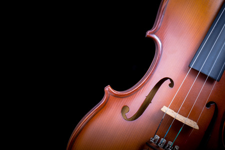Vintage violin on black backgroundの写真素材