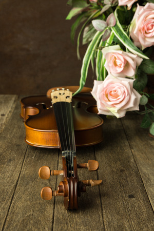 Vintage violin with old steel backgroundの写真素材