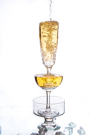 cocktail splash on white background.の写真素材