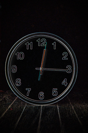 white clock on a table with old steel background,vintage style