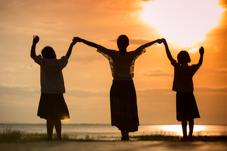 Happiness woman and sunlight of sunsetの写真素材