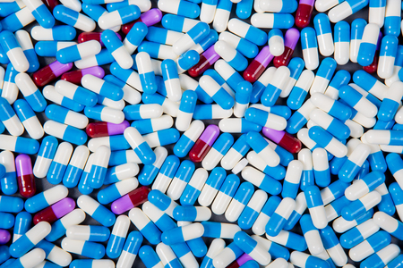 colorful drugs and supplement pills. Background or texture