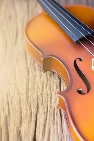 part of violin on wood background,vintage styleの写真素材
