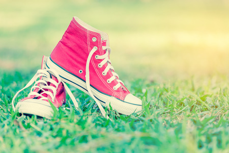 red shoes on grass backgroundの写真素材