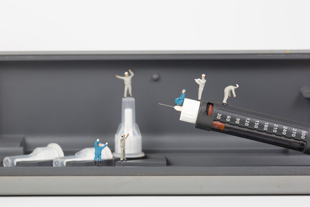 insulin pen and people,miniatureの写真素材