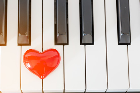red heart on piano,love conceptの写真素材