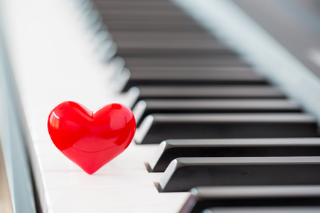 red heart on piano,love conceptの写真素材