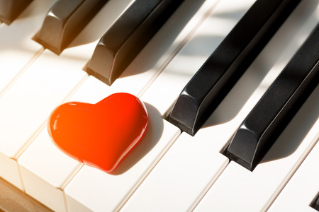 red heart on piano,love conceptの写真素材