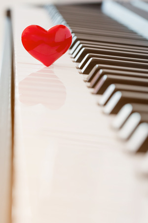 red heart on piano,love conceptの写真素材