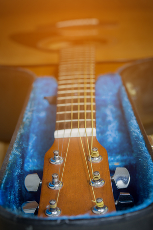 acoustic guitar with hard caseの写真素材